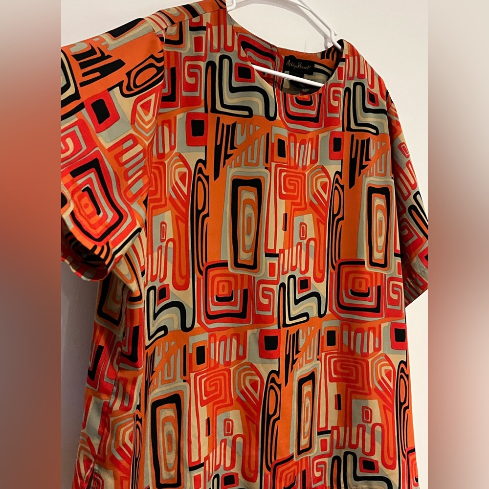 Geometric Inspired Orange Top by Ashley Stewart